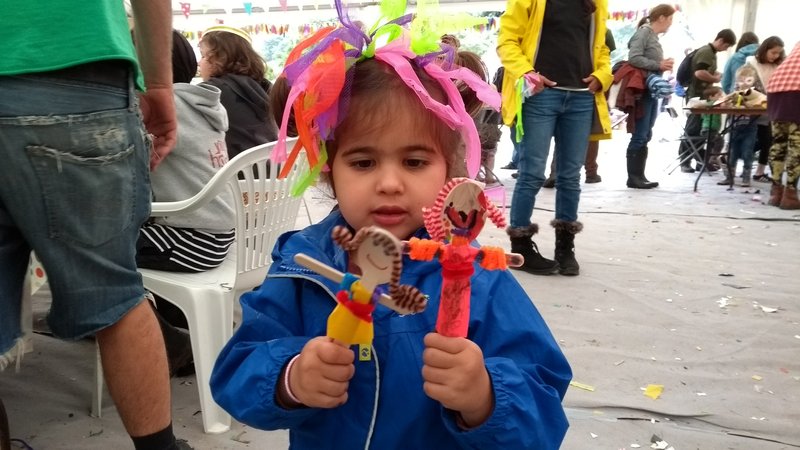 Making spoon puppets and ribbon headdresses at Green Man Festival